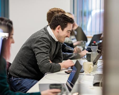 Energy manager working at a computer.